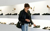a woman shopping for shoes